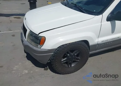 2004 Jeep Grand Cherokee Laredo z USA, uszkodzony, nr VIN 1J4GX48S84C284581